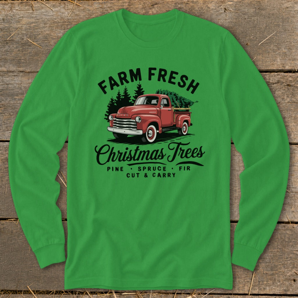Green long-sleeve shirt with red farm truck graphic and "Farm Fresh Christmas Trees" text.