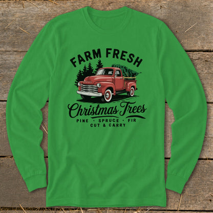 Green long-sleeve shirt with red farm truck graphic and "Farm Fresh Christmas Trees" text.