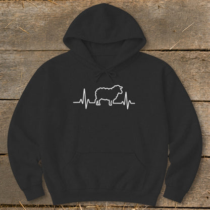 Black pullover hoodie with a white heart beat line graphic featuring a sheep in the center.