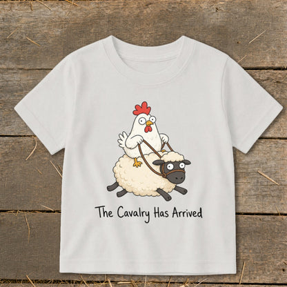 White t-shirt with cartoon chicken riding a sheep, text "The Cavalry Has Arrived".