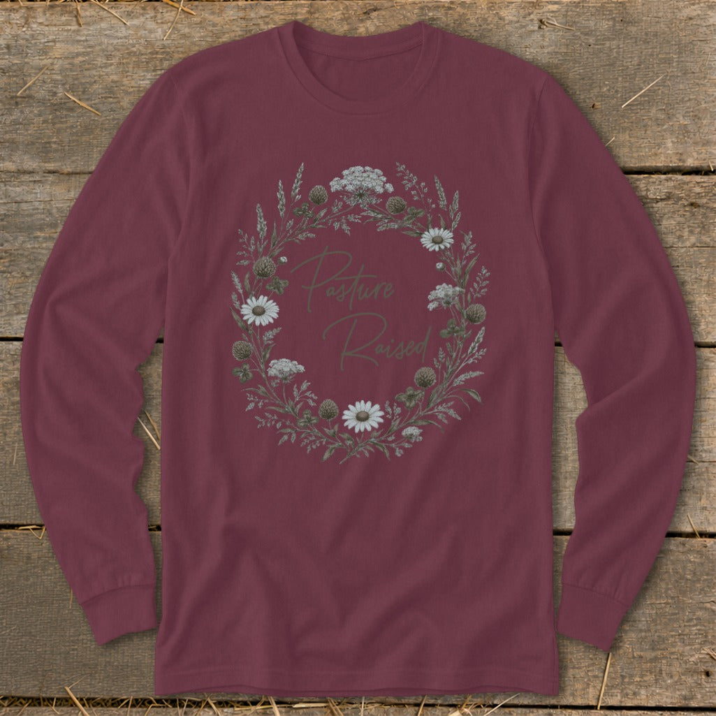 Maroon long-sleeve shirt with a floral wreath and "Pasture Raised" text.