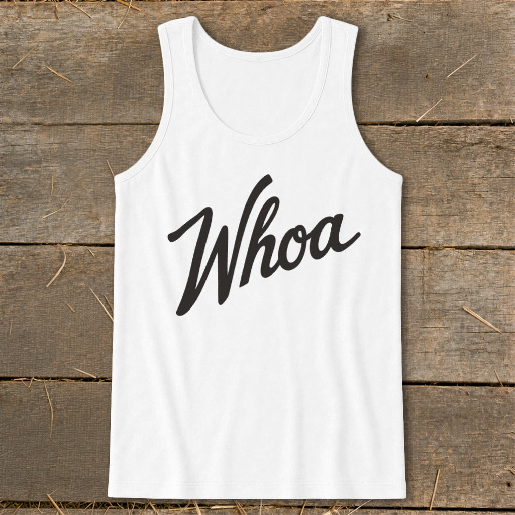 White tank top with the word "Whoa" in black cursive lettering.