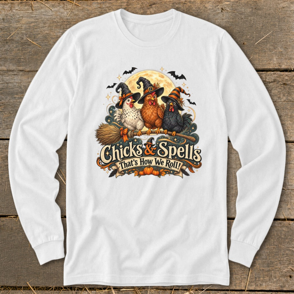 Three chickens in witch hats sit on a broomstick with text "Chicks & Spells".