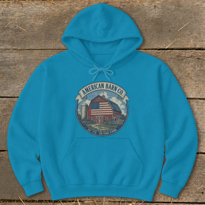 Teal hoodie with American Barn Co. circular logo featuring a barn, silo, and US flag.