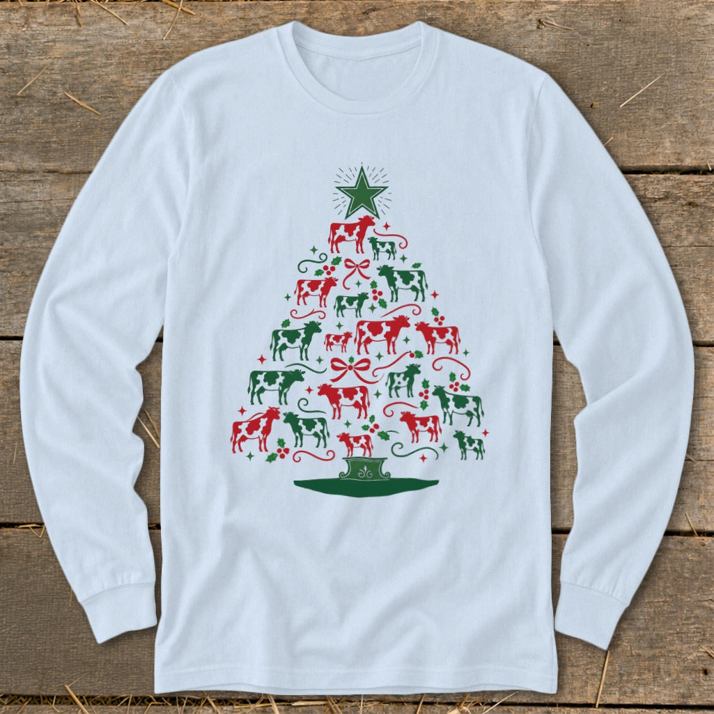 White long-sleeve shirt with a Christmas tree made of red and green cows.
