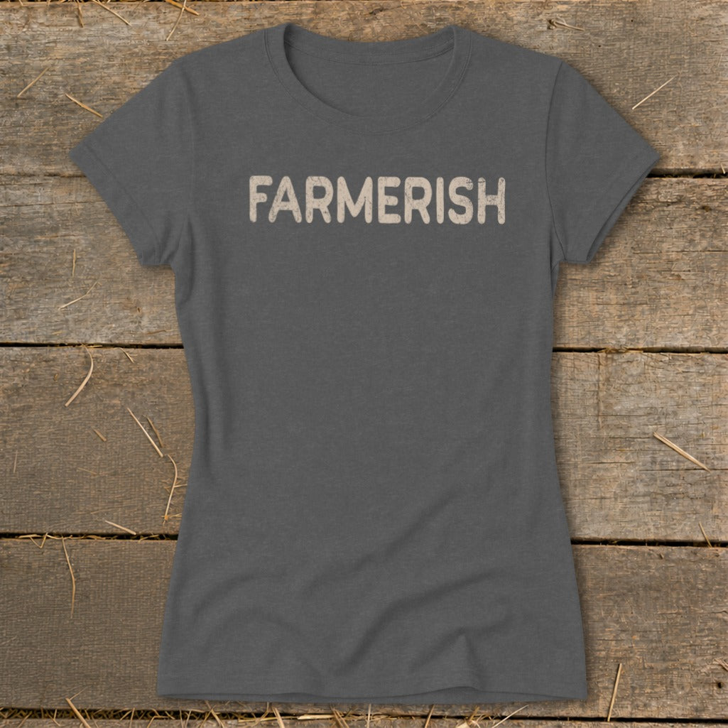 Gray t-shirt with "FARMERISH" text on a wooden background.
