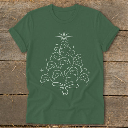 Green t-shirt with white line art of a Christmas tree made of sheep and a star.