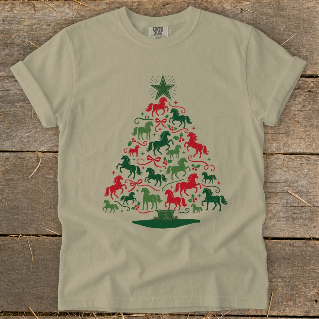 Light tan t-shirt with a Christmas tree made of red and green horses.