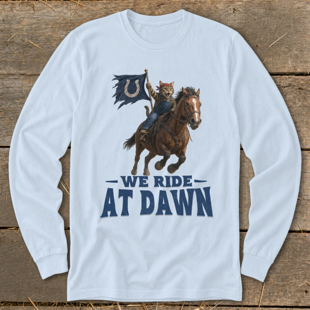 Cat in overalls riding a horse, holding a flag with a horseshoe logo. Text reads "WE RIDE AT DAWN."