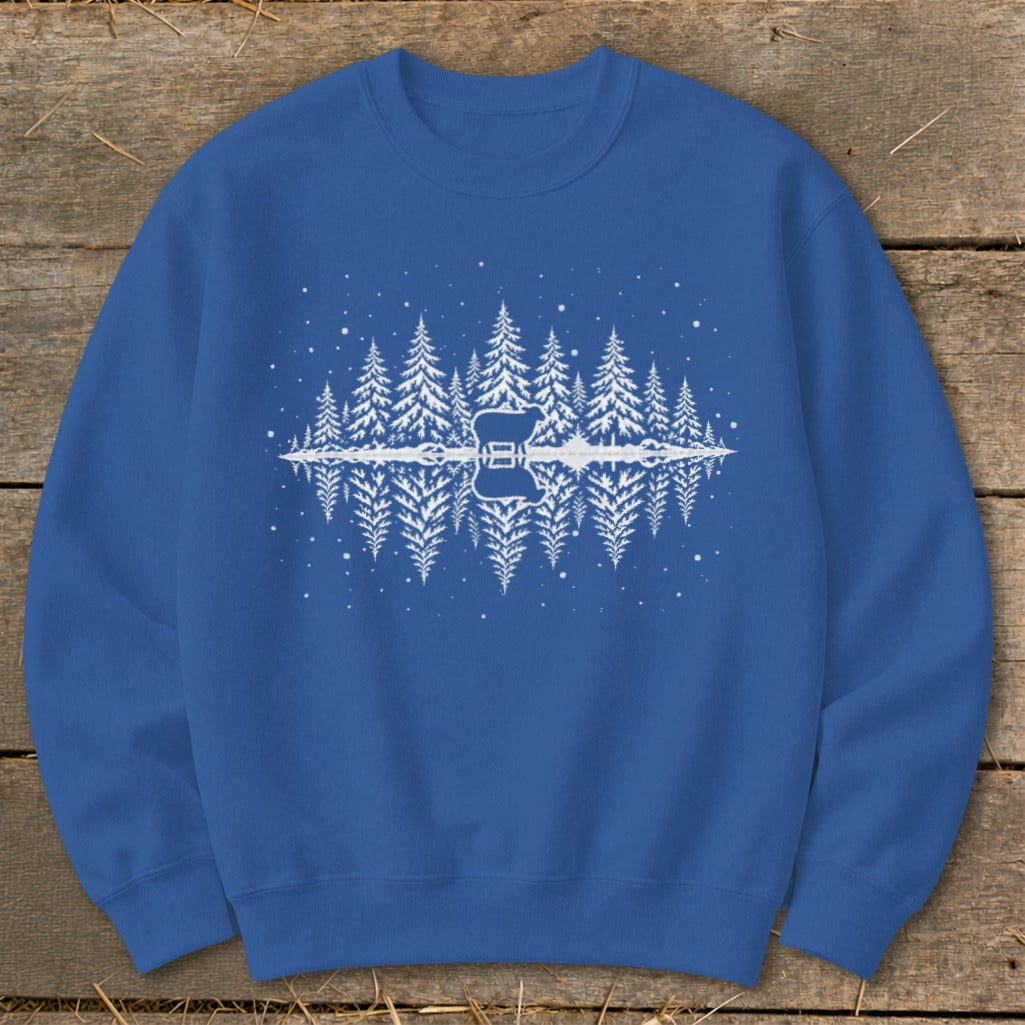 Blue sweatshirt with a white graphic of a sheep reflected in a mirrored forest.