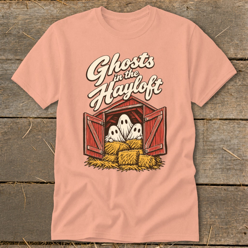 Ghosts in the Hayloft graphic on a light peach t-shirt.