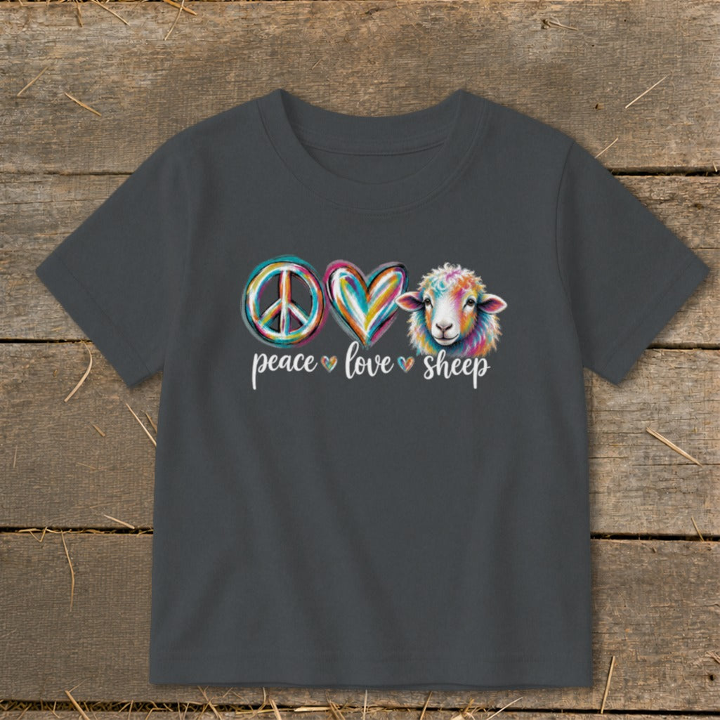 Peace, Love, Sheep graphic with colorful symbols and sheep on a charcoal t-shirt.