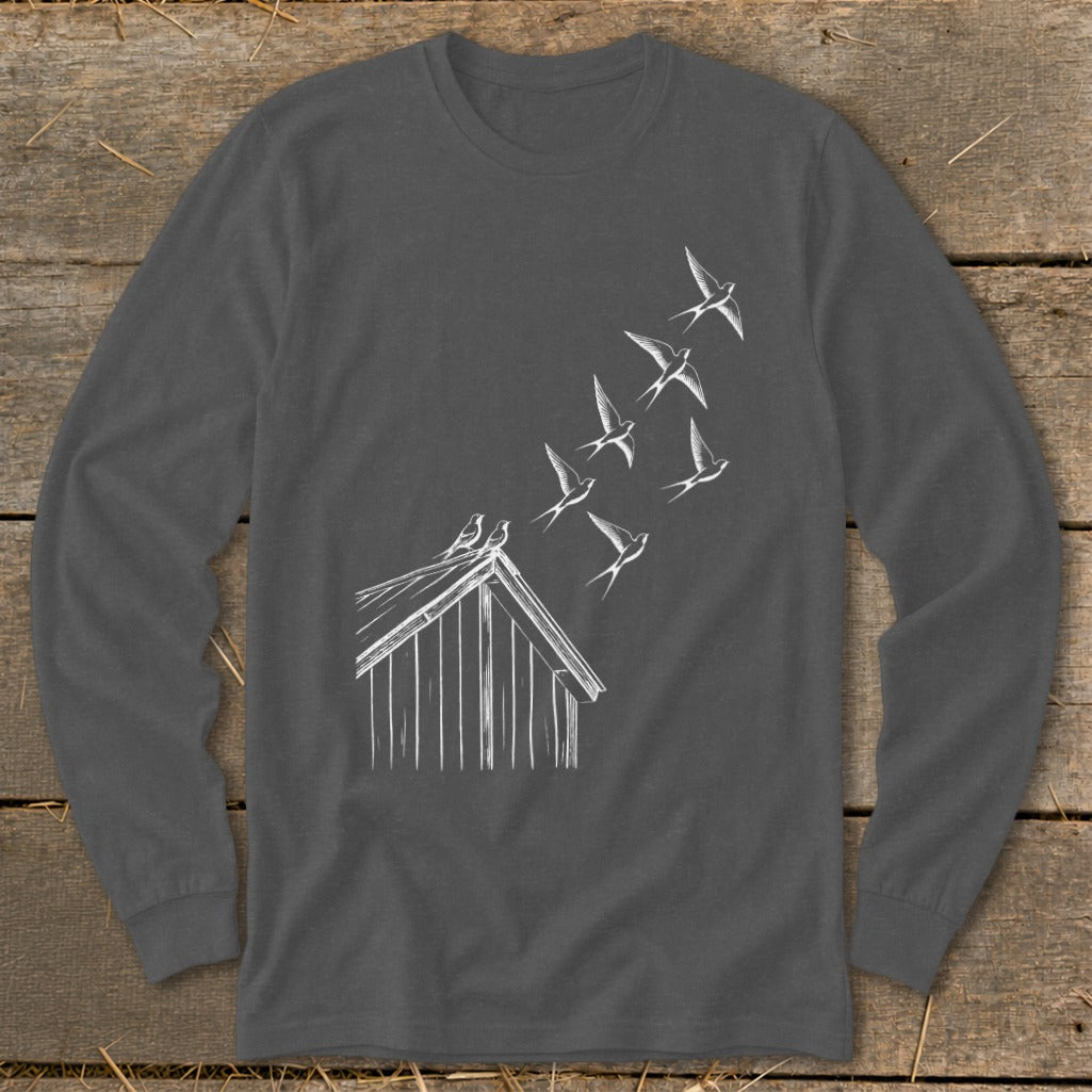 Dark gray long-sleeve t-shirt with a white line drawing of birds flying from a barn roof.