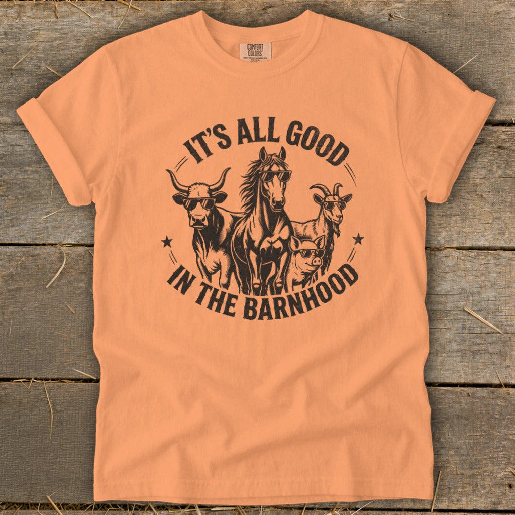 Peach t-shirt with cow, horse, goat, and pig wearing sunglasses, text "IT'S ALL GOOD IN THE BARNHHOOD".