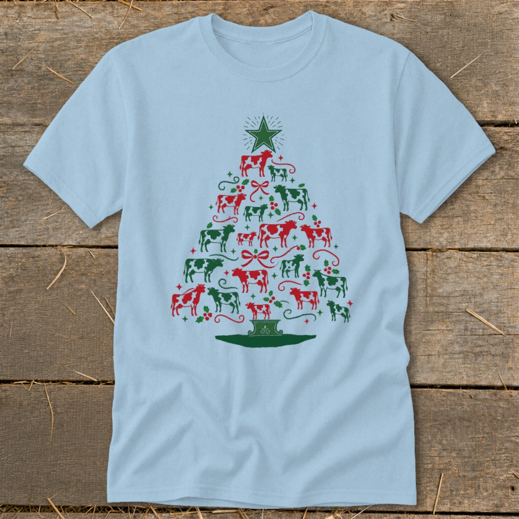 Light blue t-shirt with a Christmas tree made of red and green cows.