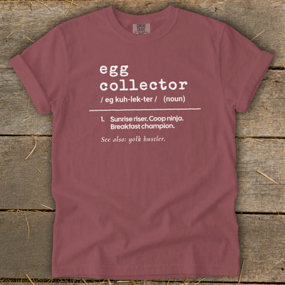 Maroon t-shirt with "egg collector" definition: Sunrise riser, Coop ninja, Breakfast champion.
