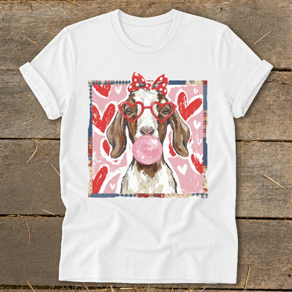 Goat with heart glasses and bubble gum on pink heart background.