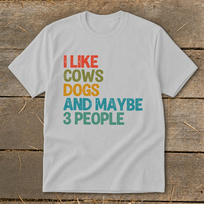 White t-shirt with "I like cows, dogs, and maybe 3 people" text.