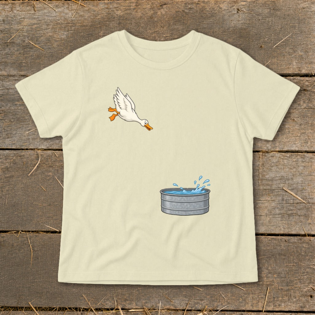 White duck jumping into a galvanized metal tub with splashing water.