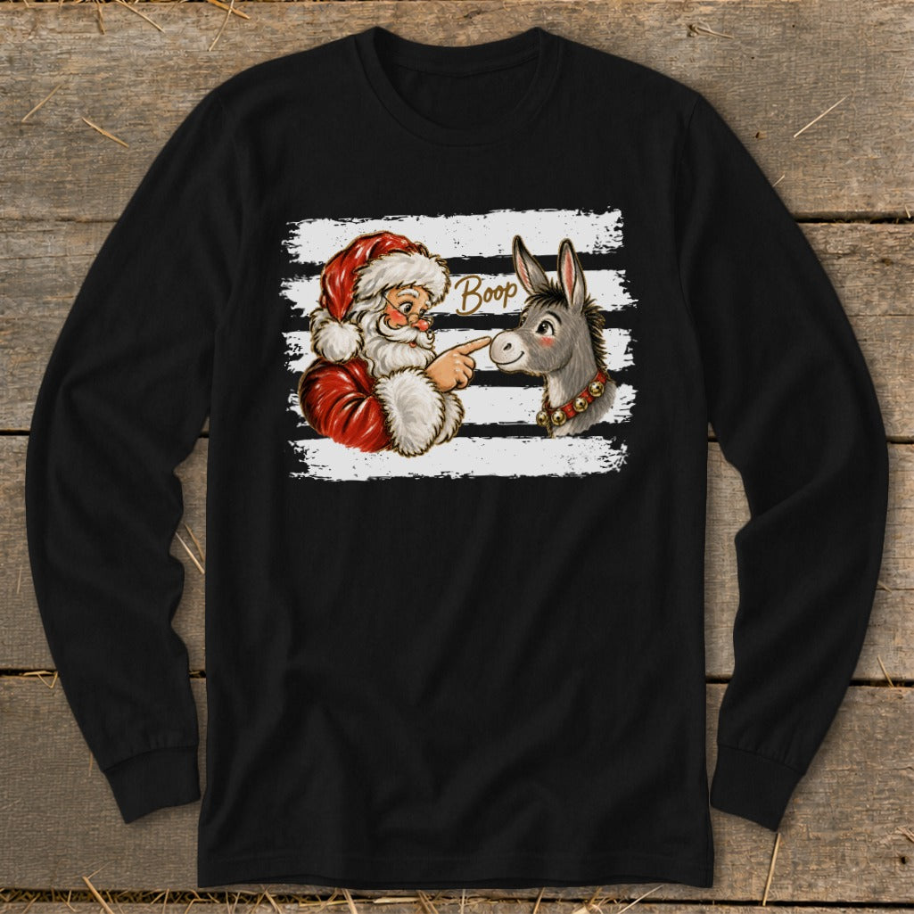 Santa pointing at a donkey with the word "Boop" on black and white stripes.