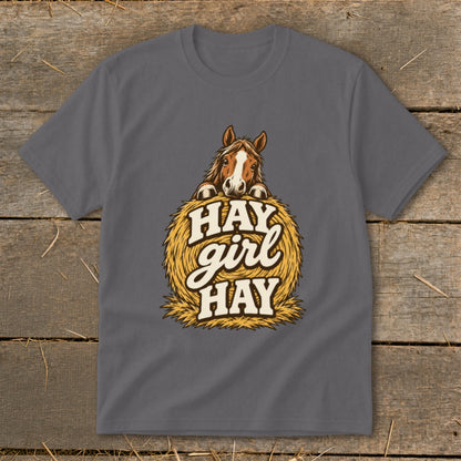Grey t-shirt with a horse peeking over a hay bale with text "HAY girl HAY".