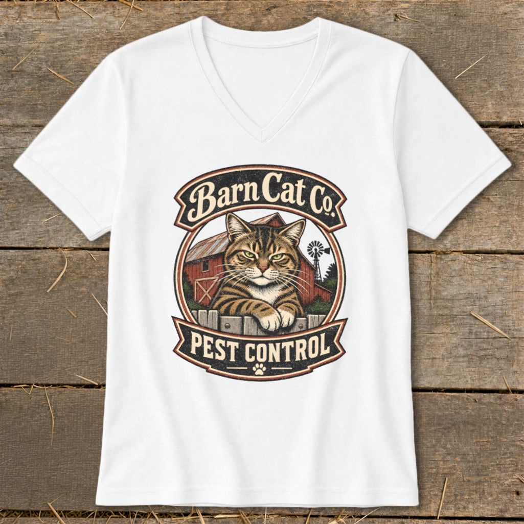 A white V-neck t-shirt featuring a vintage logo of a cat behind a fence with the text Barn Cat Co Pest Control.