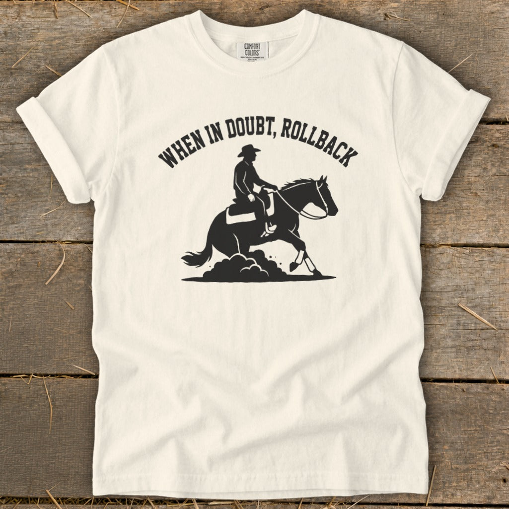Cream t-shirt with black graphic: "When in Doubt, Rollback" and a cowboy riding a horse.
