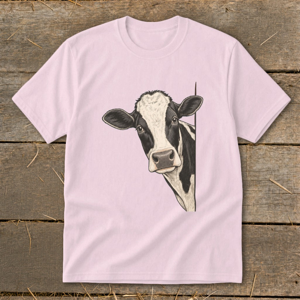 Pink t-shirt with a black and white cow peeking from the right side.