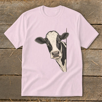 Pink t-shirt with a black and white cow peeking from the right side.