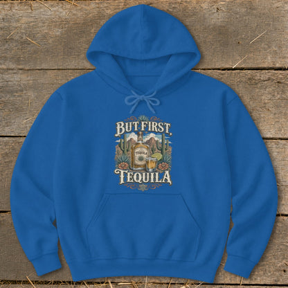 Royal blue hoodie with "But First, Tequila" graphic of tequila bottle and shot.