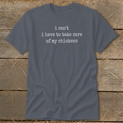 Gray t-shirt with white text that says "i can't i have to take care of my chickens".