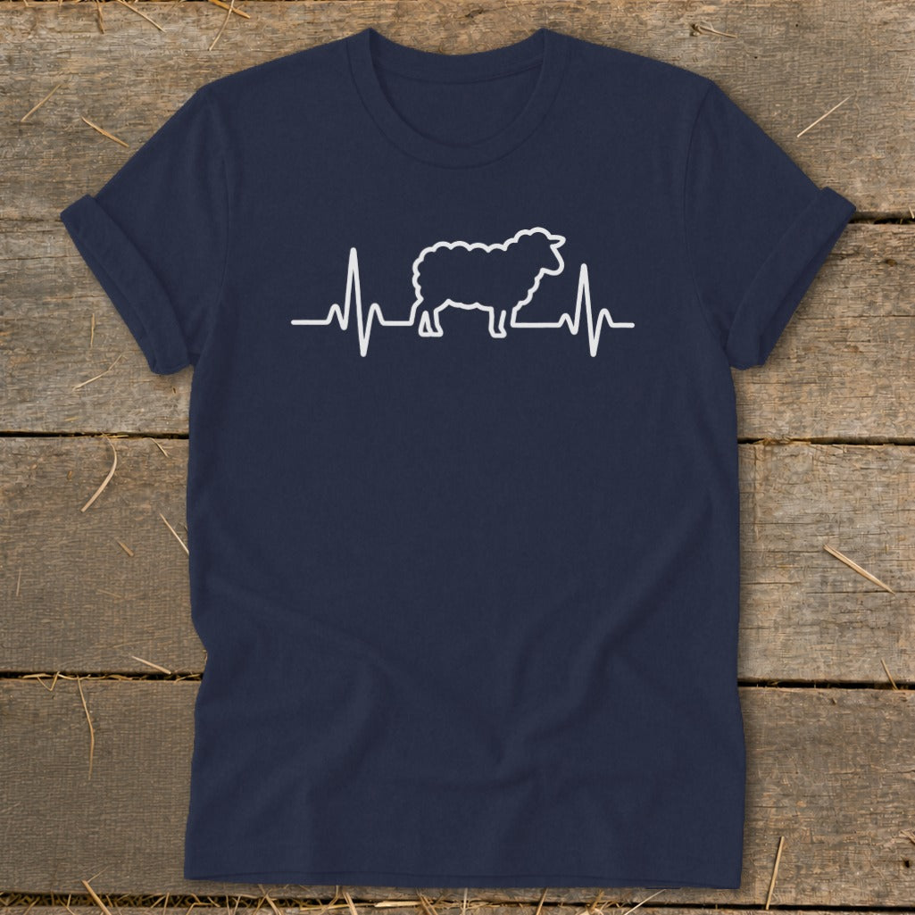 A dark blue t-shirt with a white graphic of a sheep overlaid on a heartbeat line.