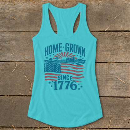Turquoise tank top with "HOME GROWN SINCE 1776" graphic featuring an American flag and farm scene.