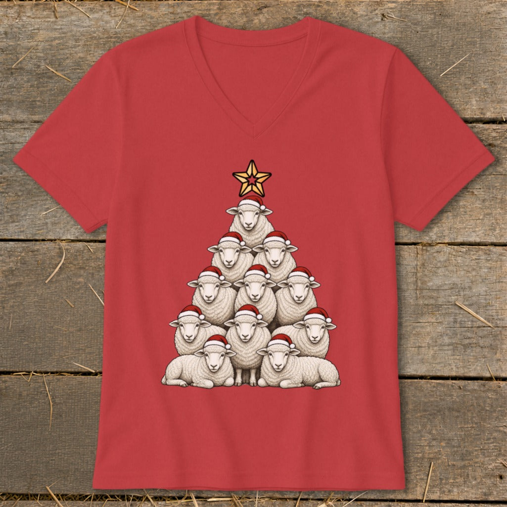 Red t-shirt with a Christmas tree made of sheep wearing Santa hats and a star.