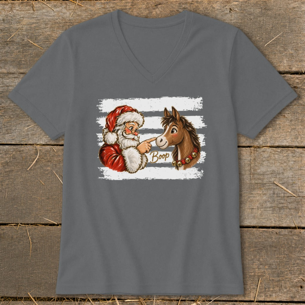 Santa booping a horse with the word "Boop" on a t-shirt.