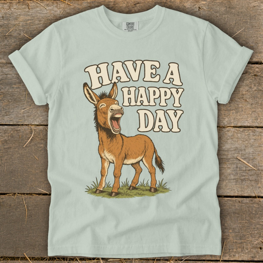 Light blue t-shirt with laughing donkey and text "HAVE A HAPPY DAY".