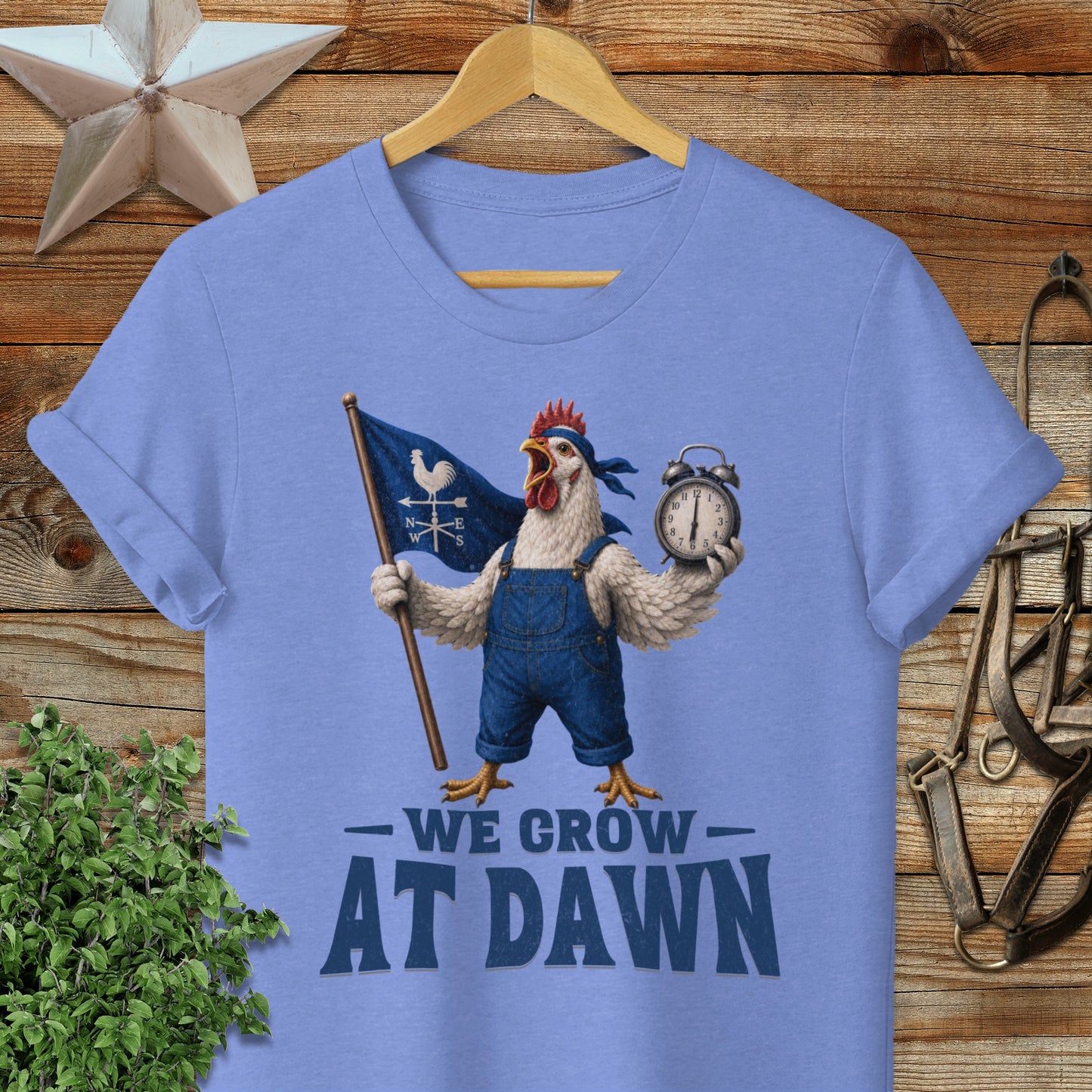 Chicken in overalls holding a flag and alarm clock, "We Grow At Dawn" text.