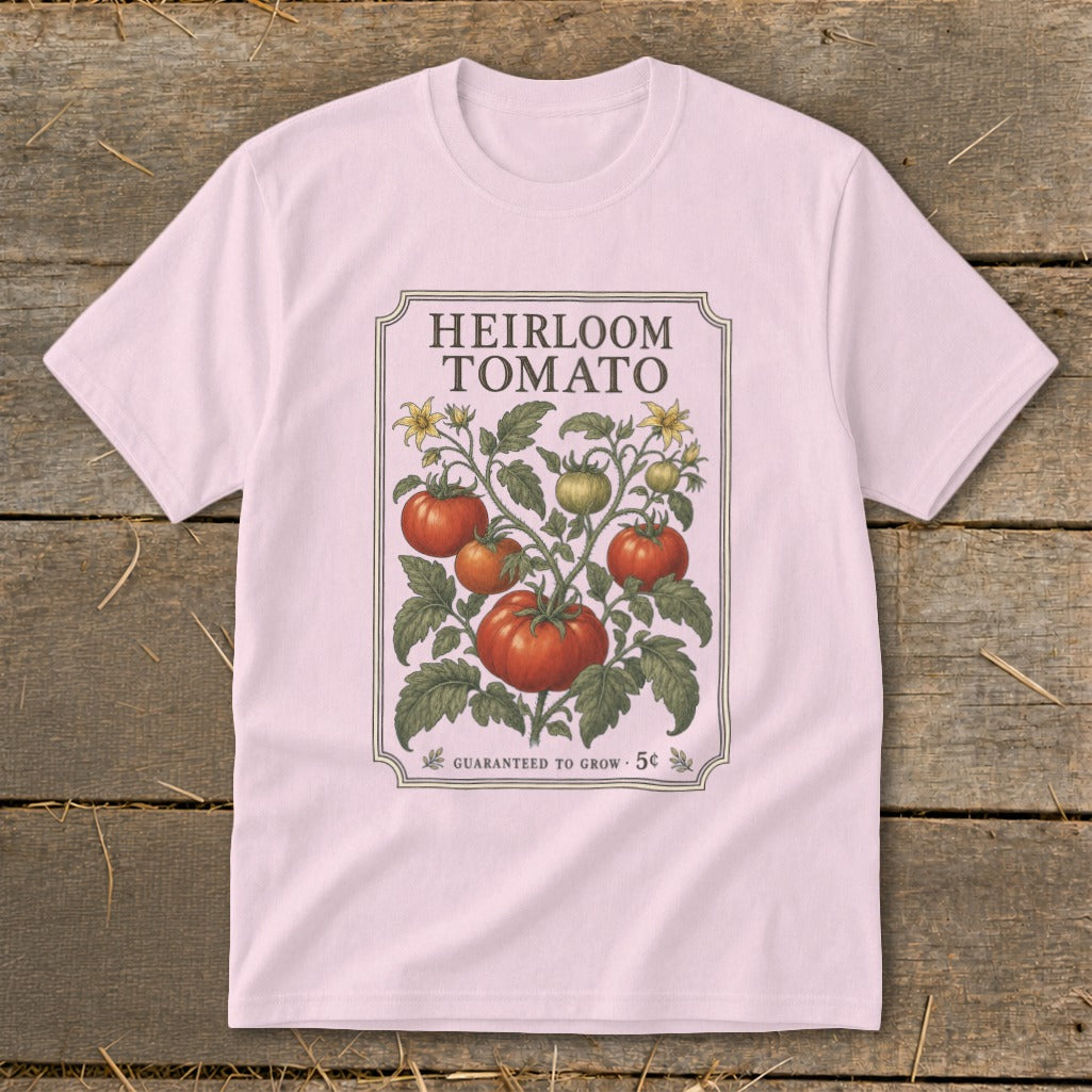 Pink t-shirt with "Heirloom Tomato" design, featuring vine and fruit illustration.