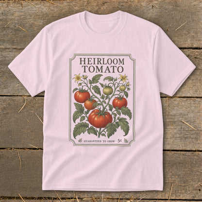 Pink t-shirt with "Heirloom Tomato" design, featuring vine and fruit illustration.