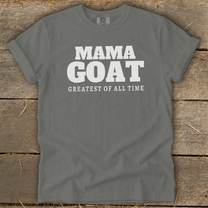 Gray t-shirt with white text "MAMA GOAT GREATEST OF ALL TIME".