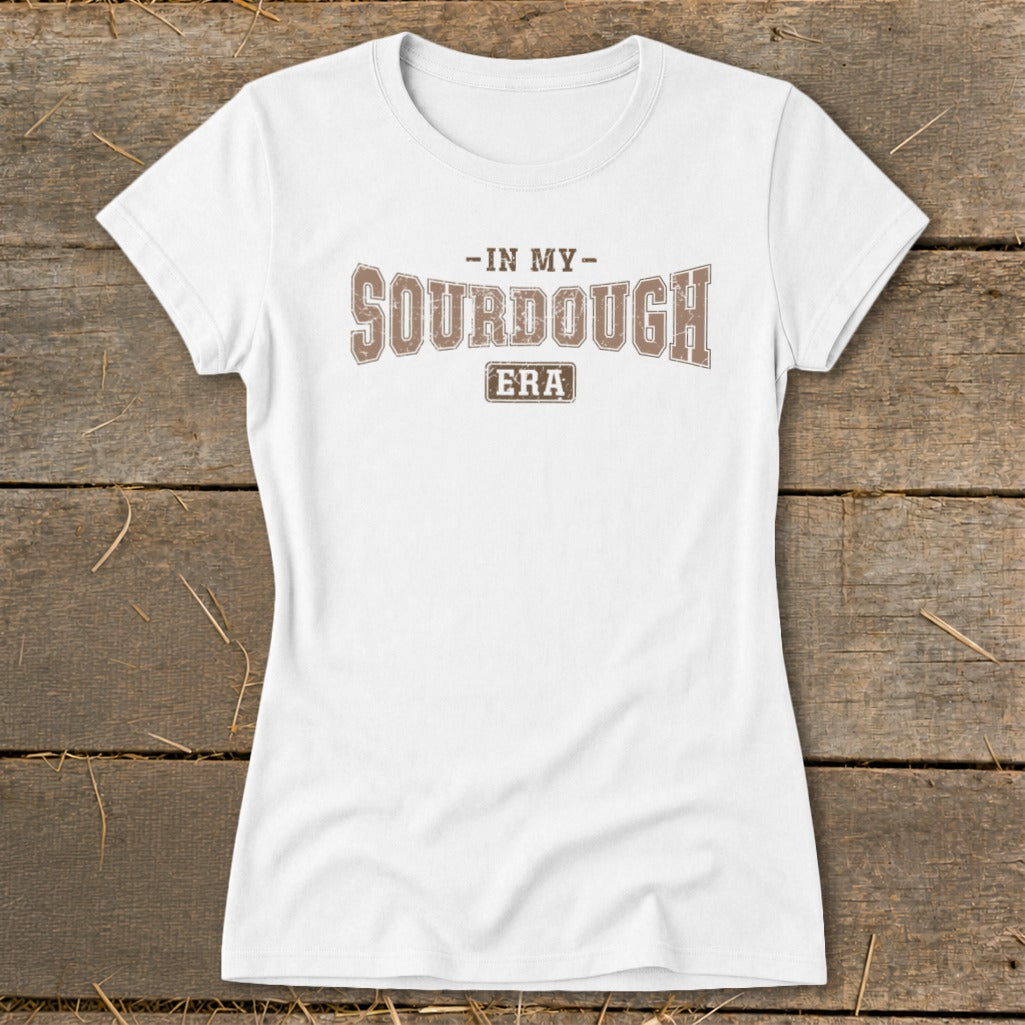 White t-shirt with brown text reading "-IN MY- SOURDOUGH ERA"