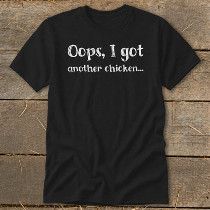Black t-shirt with white text reading "Oops, I got another chicken..."