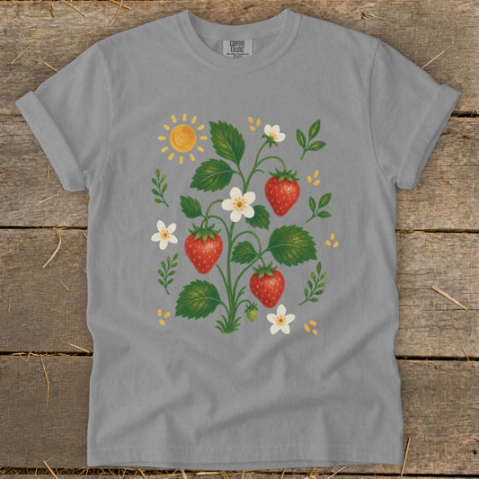 Grey t-shirt with a watercolor illustration of a strawberry plant and the sun.