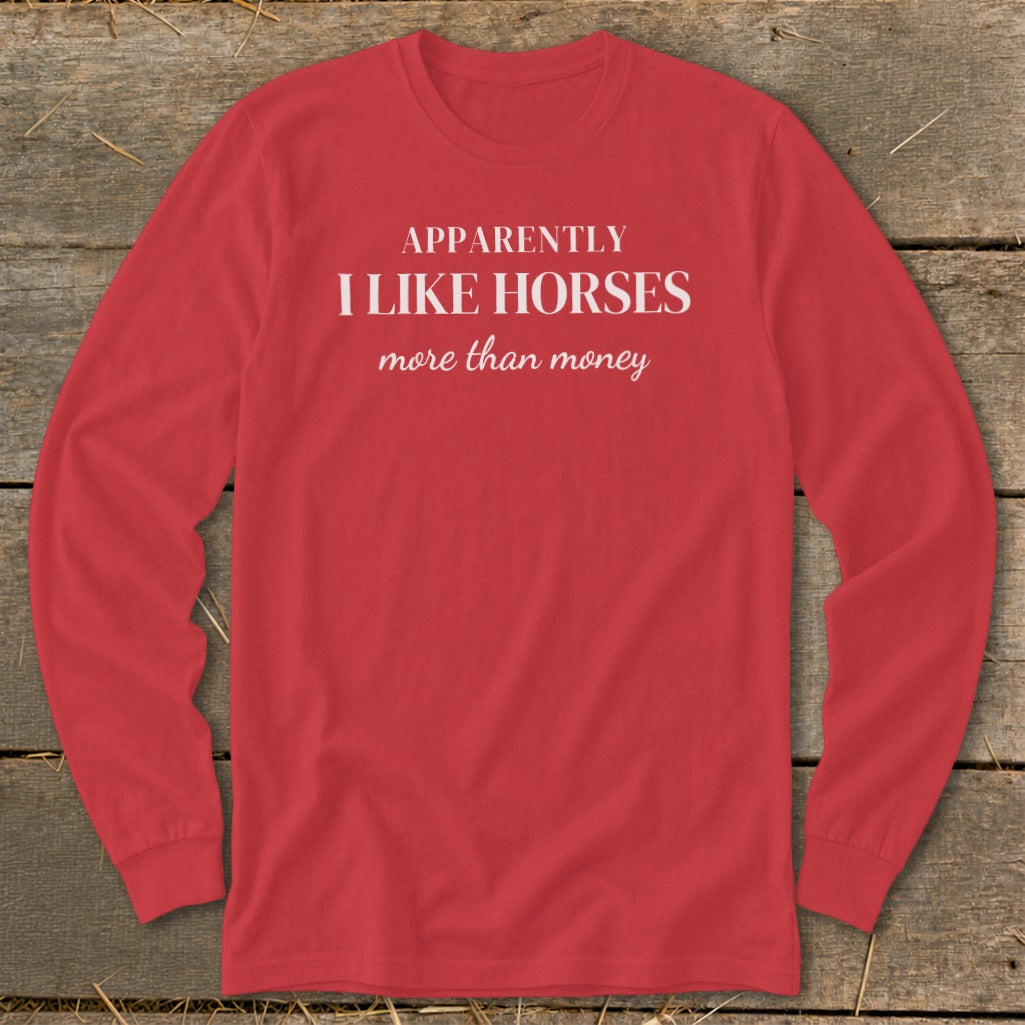 Red long sleeve shirt with "APPARENTLY I LIKE HORSES more than money" text.