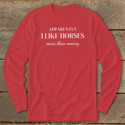 Red long sleeve shirt with "APPARENTLY I LIKE HORSES more than money" text.