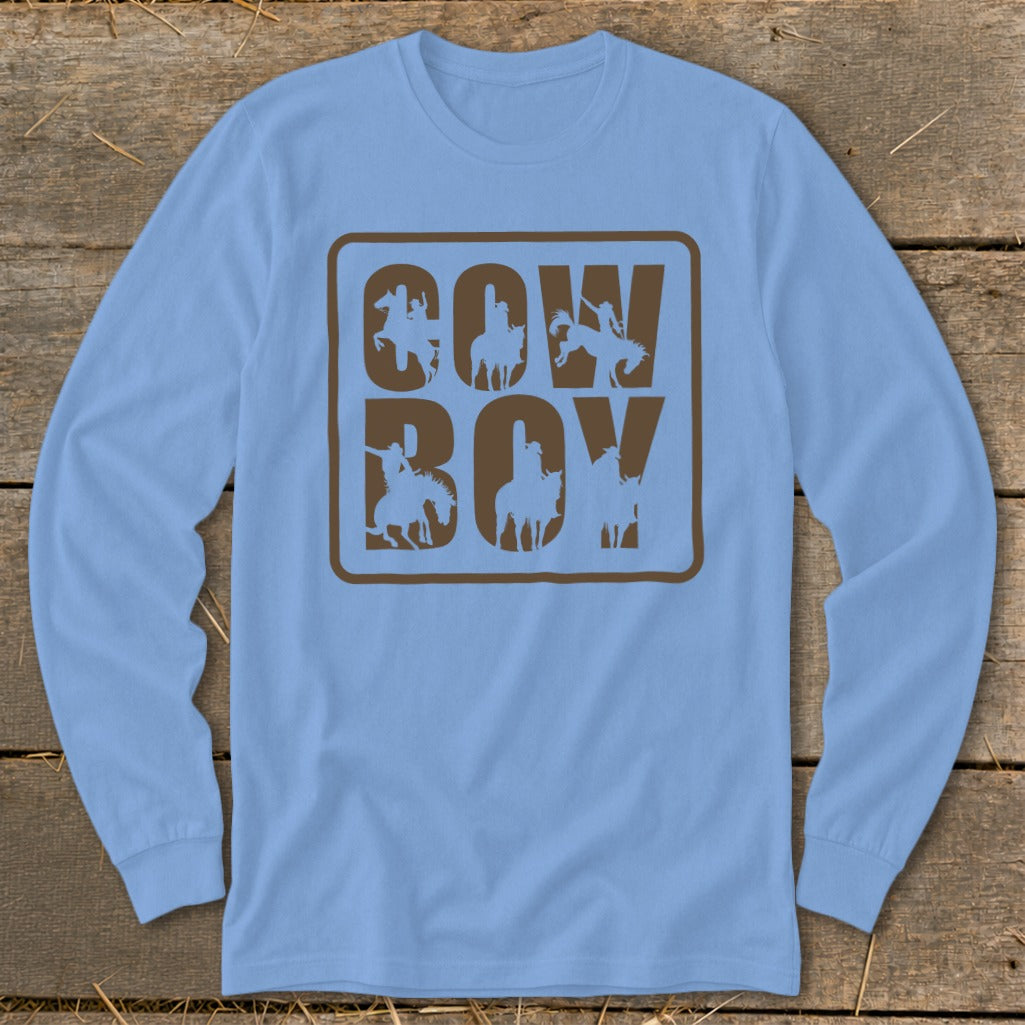 Light blue long-sleeve shirt with "COW BOY" in brown letters featuring cowboy silhouettes.