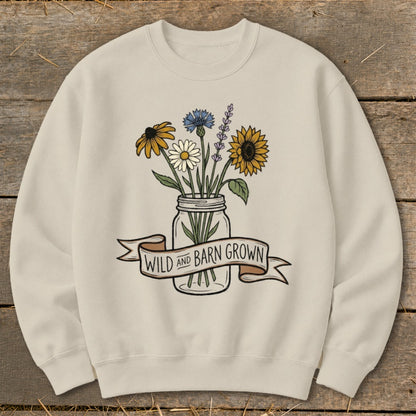 Cream sweatshirt with wildflowers in a mason jar and "Wild and Barn Grown" banner.