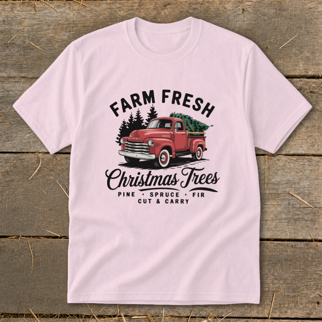 Pink t-shirt with "Farm Fresh Christmas Trees" design featuring a red vintage truck.