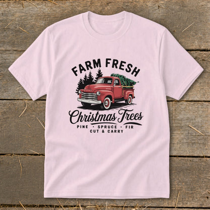 Pink t-shirt with "Farm Fresh Christmas Trees" design featuring a red vintage truck.