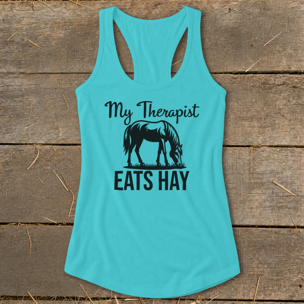 Turquoise tank top with "My Therapist Eats Hay" text and horse graphic.